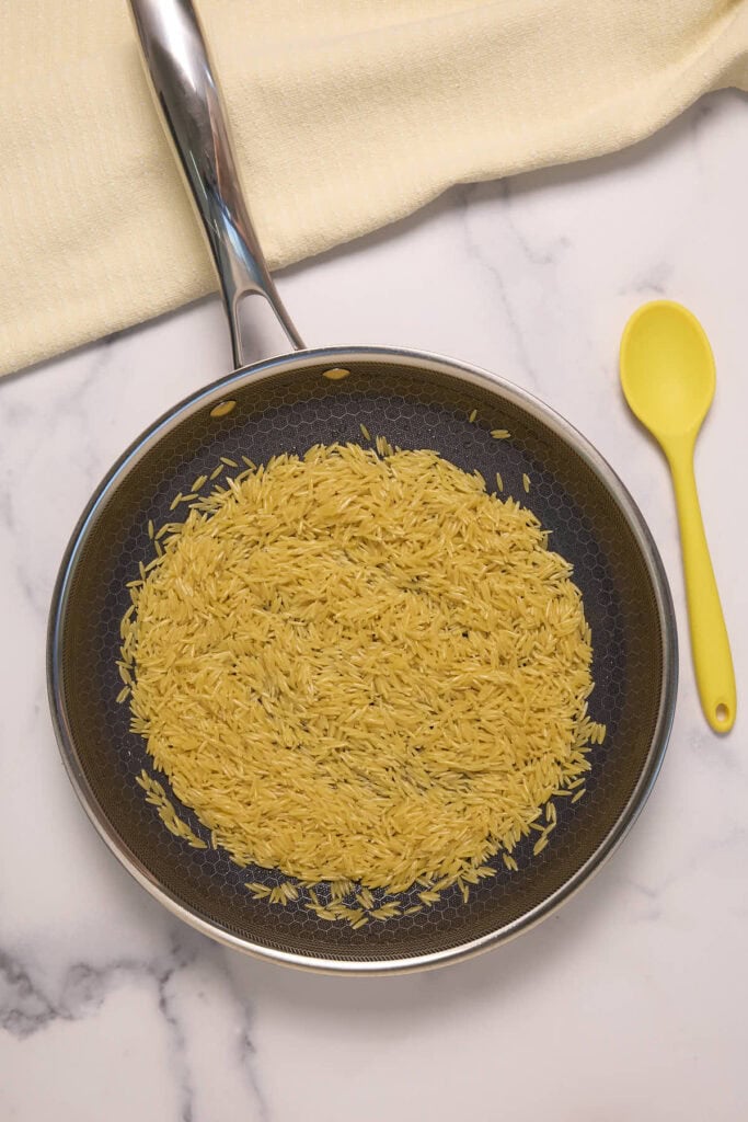 coating the orzo in olive oil helps it carmelize without burning