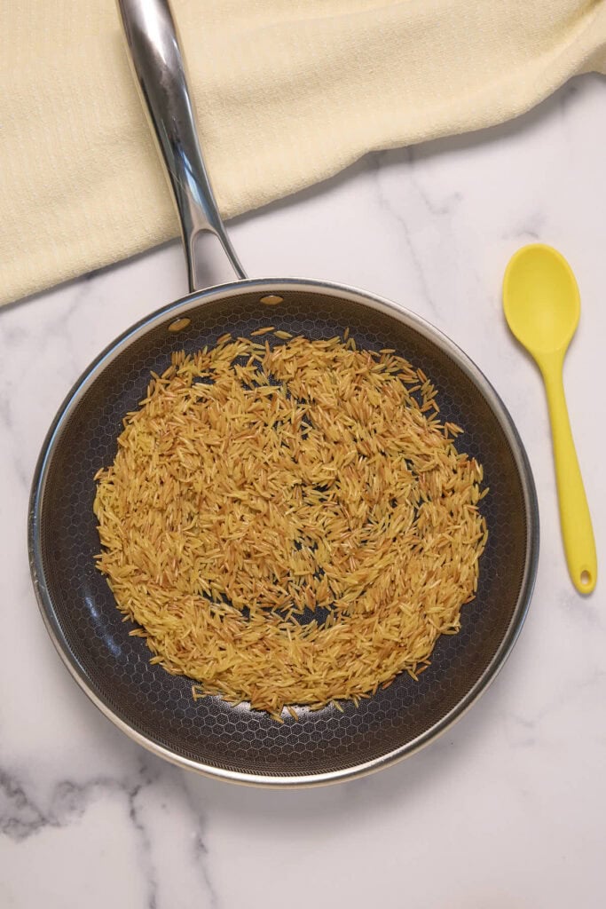 toasted orzo for this recipe with cherry tomatoes and feta makes the final dish so much more delicious