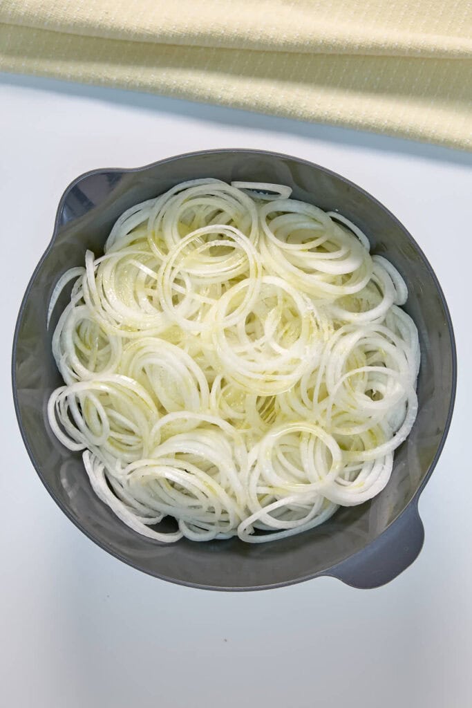 sliced onions tossed in olive oil and salt