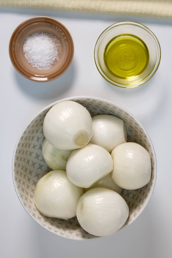 peeled onions, salt, and olive oil