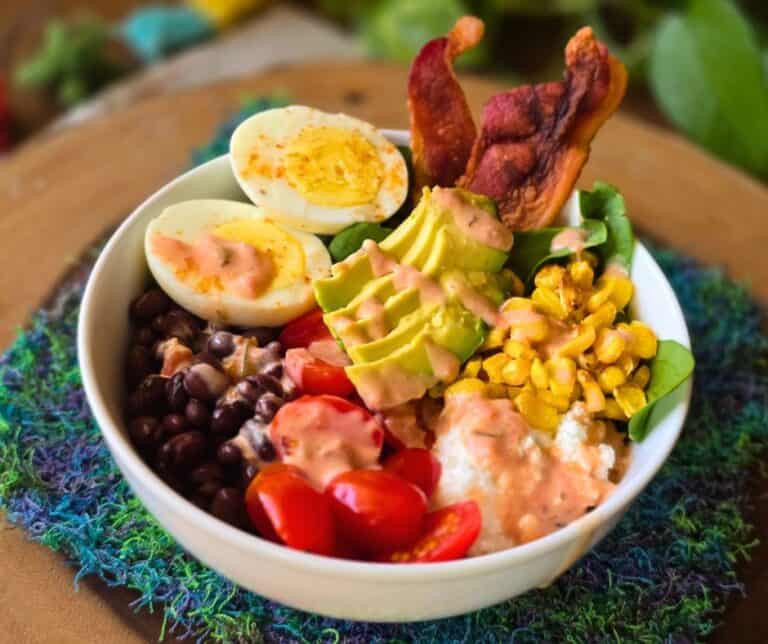 Tex mex cottage cheese bowl with egg bacon and avocado slices
