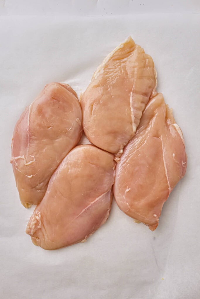Gently tenderized and flattened chicken breasts of a uniform thickness