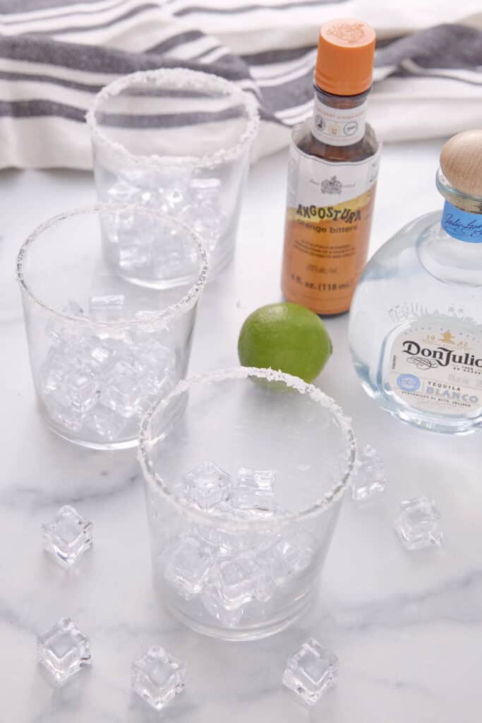 three margarita glasses with their rims salted
